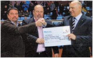 Steven Bond and Garry Davies Presenting a Cheque for £11,000 to Acorns